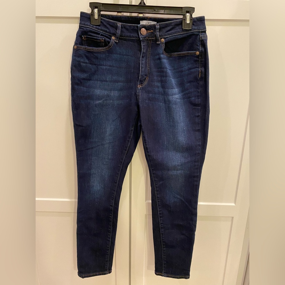 Loft dark denim jeans, straight legs, skinny, and stretch fabric.